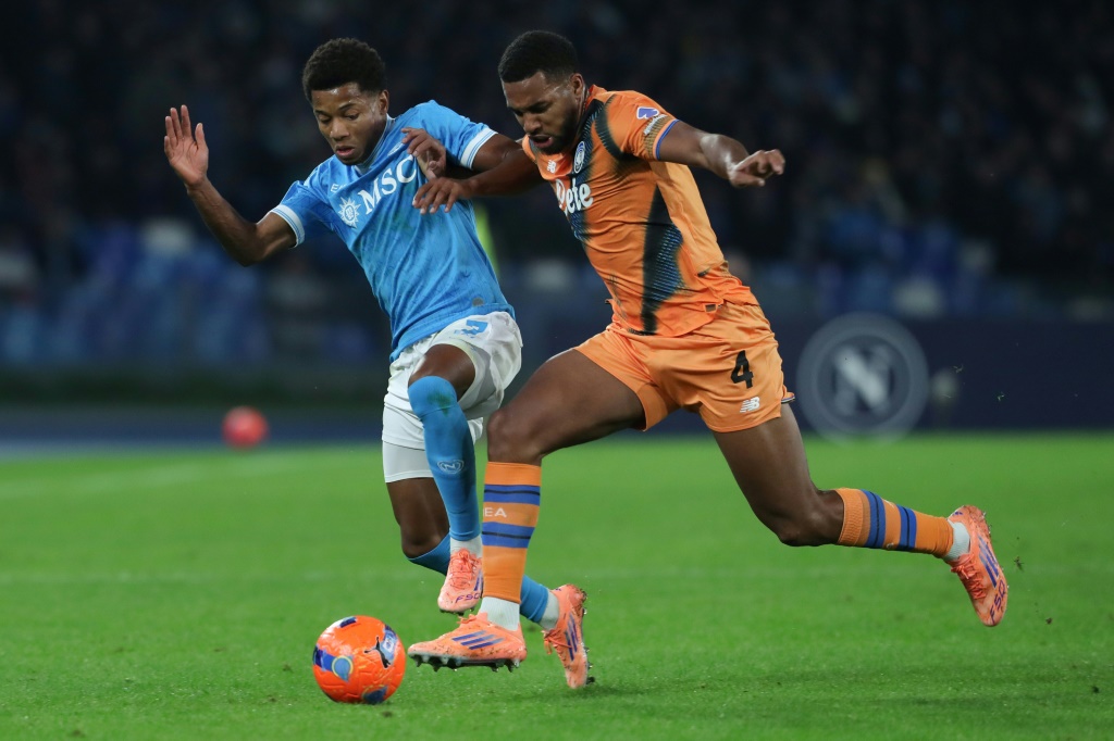 Neres' double fires Napoli to top in Italy