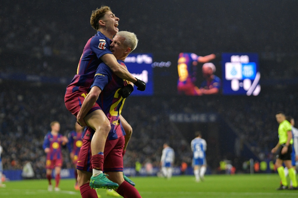 Olmo and Lewandowski seal Barcelona's late triumph in derby against Espanyol