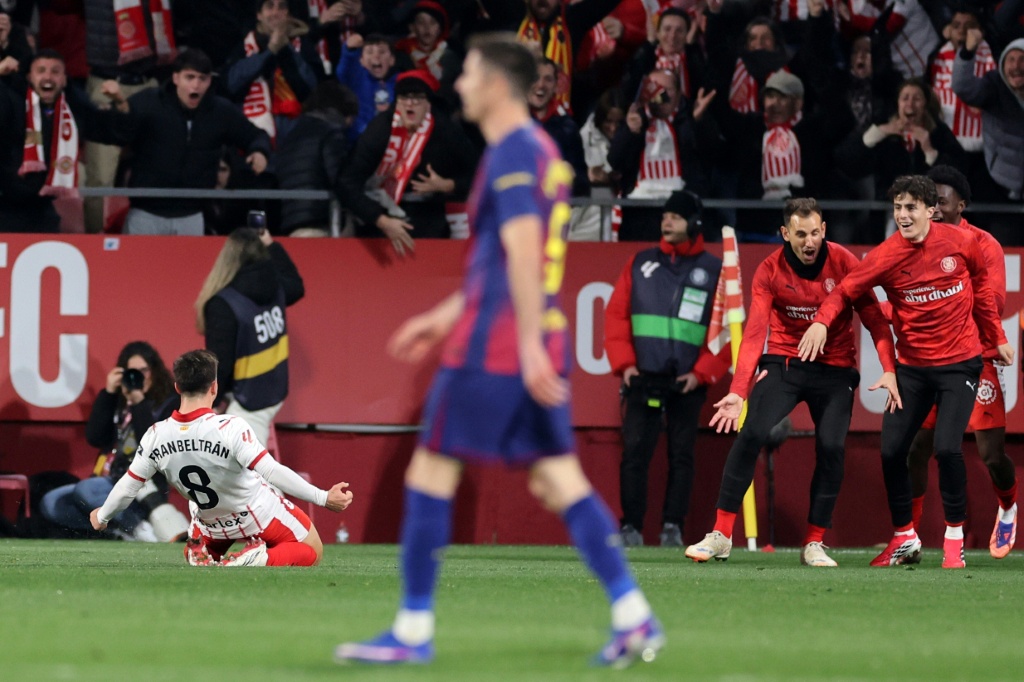 Barcelona hit by setback in title race after Girona derby loss
