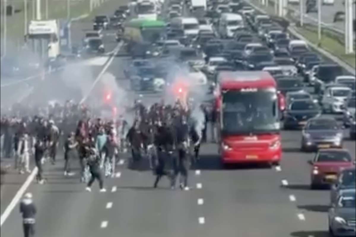 Big crowd of Ajax supporters walks onto motorway to back team before Klassieker