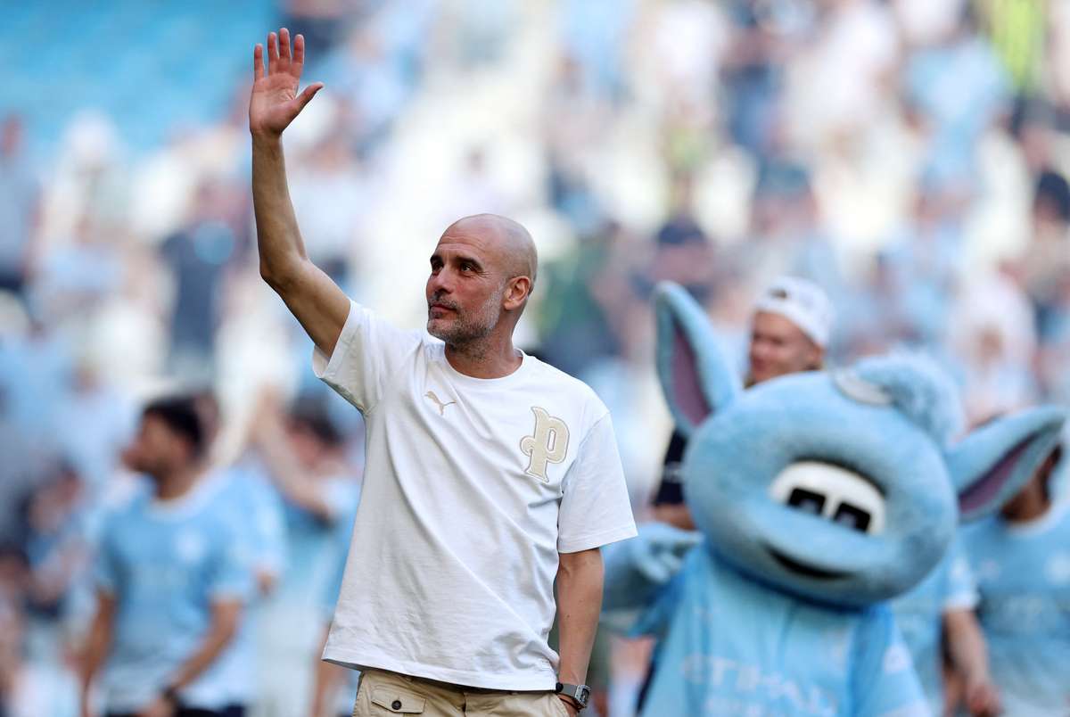 "Si jamais vous me voyez, venez me faire un câlin", déclare Guardiola aux fans de City
