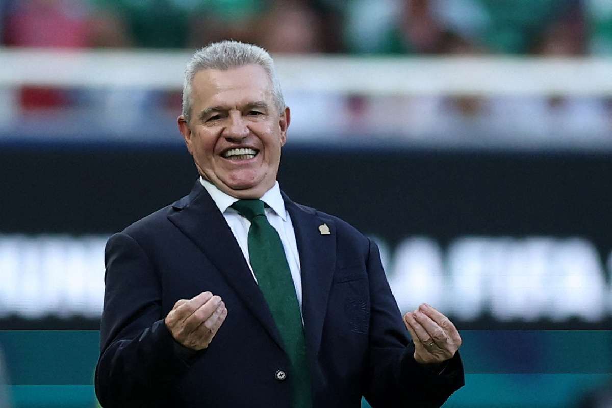Aguirre downplays Mexico's achievement after topping group for first time since 2002