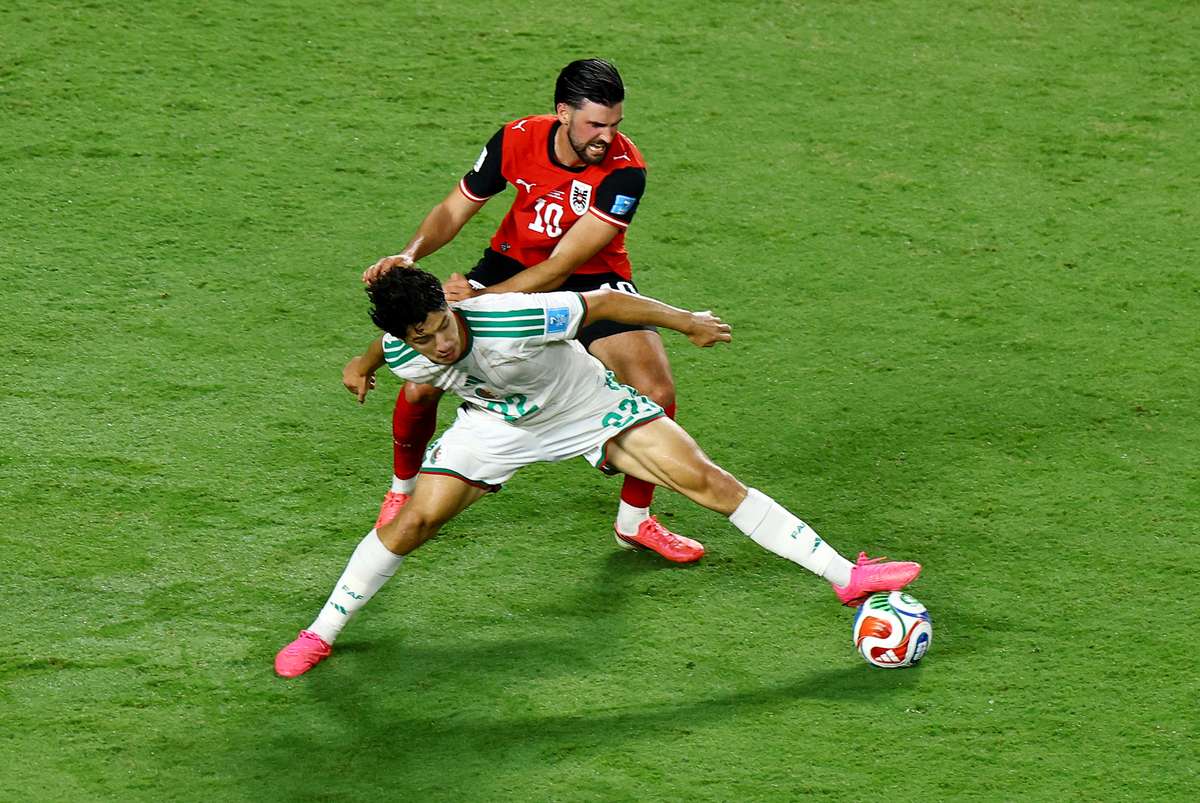 Empate no fim entre Argélia e Áustria classifica as duas seleções para 2ª fase da Copa